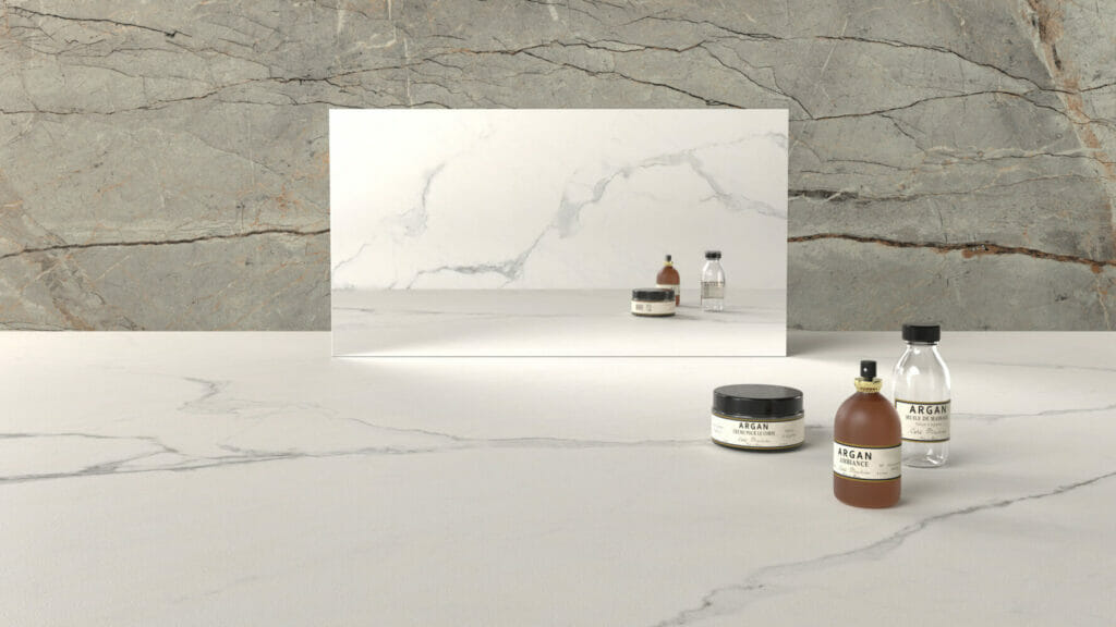 Grey and white marble surface with decorative jars, reflecting mirror, showcasing natural textures.