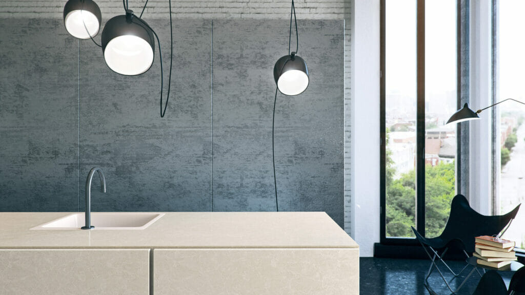 Modern kitchen featuring 5130 Cosmopolitan White countertop with sleek lighting and industrial-style decor.