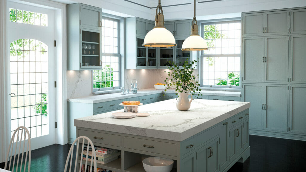 Stylish kitchen featuring Calacatta Nuvo countertops with grey streaks and a creamy-white base, brightened by natural light.