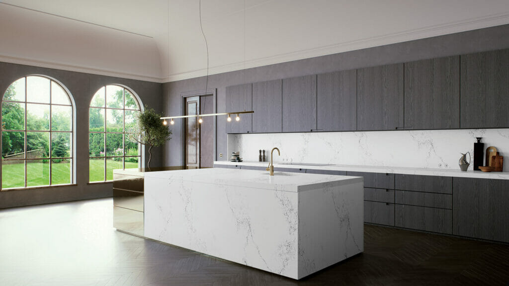 Modern kitchen featuring 5151 Empira White countertop with elegant cabinetry and large windows, showcasing natural light.