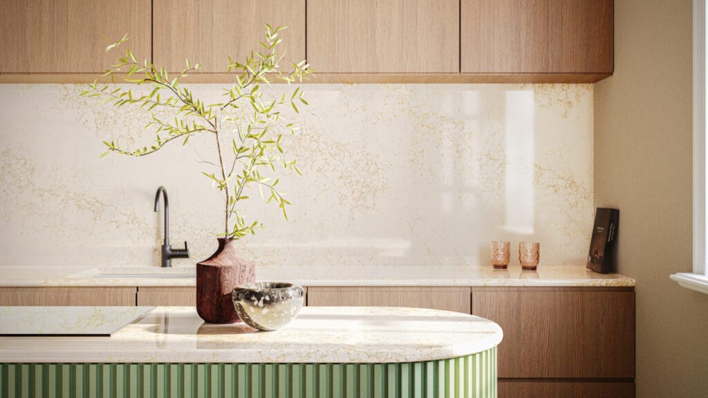 Elegant kitchen featuring a modern design with a vivid green island and a stylish vase with greenery.