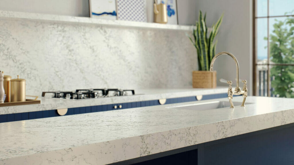 Elegant kitchen showcasing the 5171 Arabetto countertop with dynamic grey stripes and speckles on a white surface.