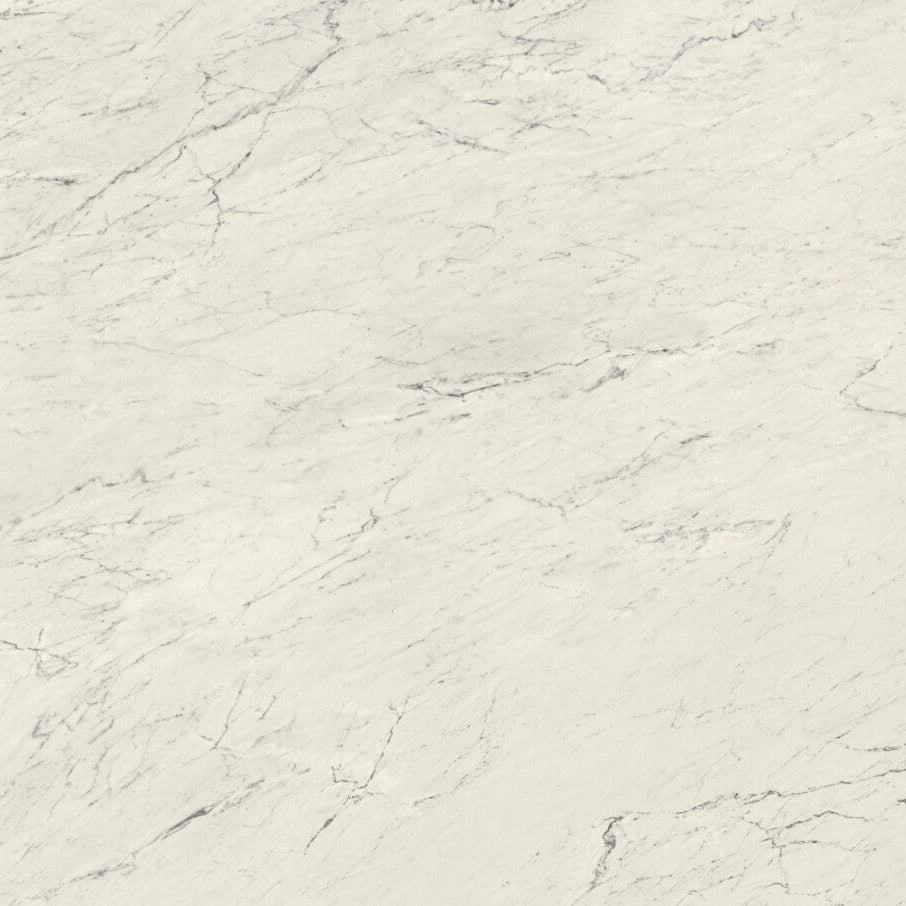 White marble texture with light-grey undertones and darker streaks, featuring soft feathery markings.