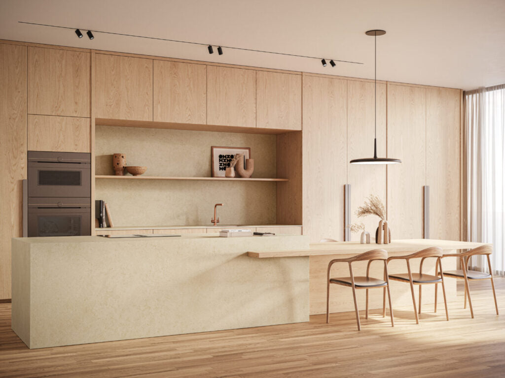 Modern kitchen featuring 543 Marenstone countertop with wooden cabinetry and warm lighting, showcasing stone finish and minimalist design.