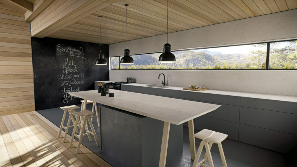 Modern kitchen design with light grey cabinetry, wood accents, and large windows showcasing a mountain view.
