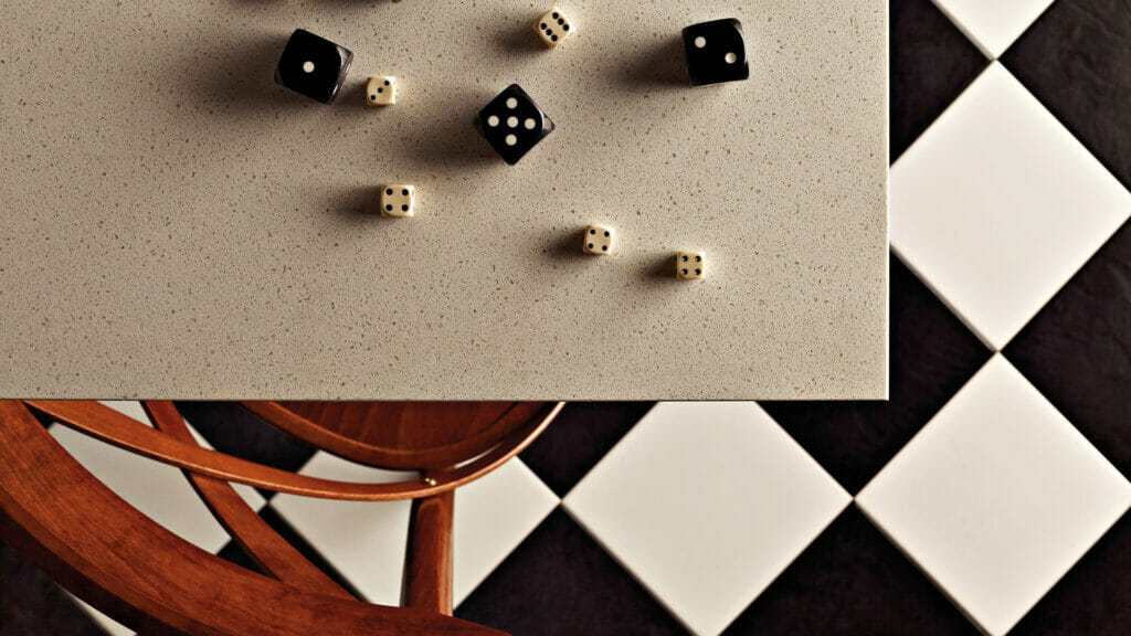 6141 Ocean Foam tabletop with black and white dice on a checkerboard floor, featuring a modern design.