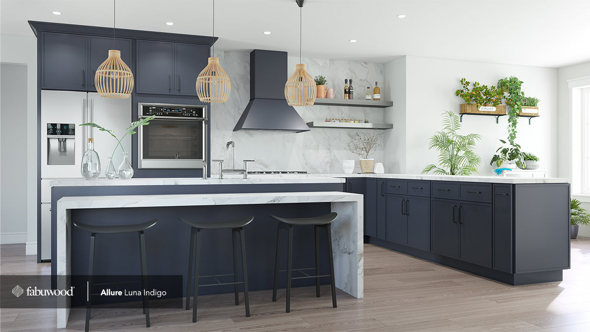 Allure Luna Indigo kitchen cabinets featuring navy blue, modern finishes, and a sleek marble countertop.
