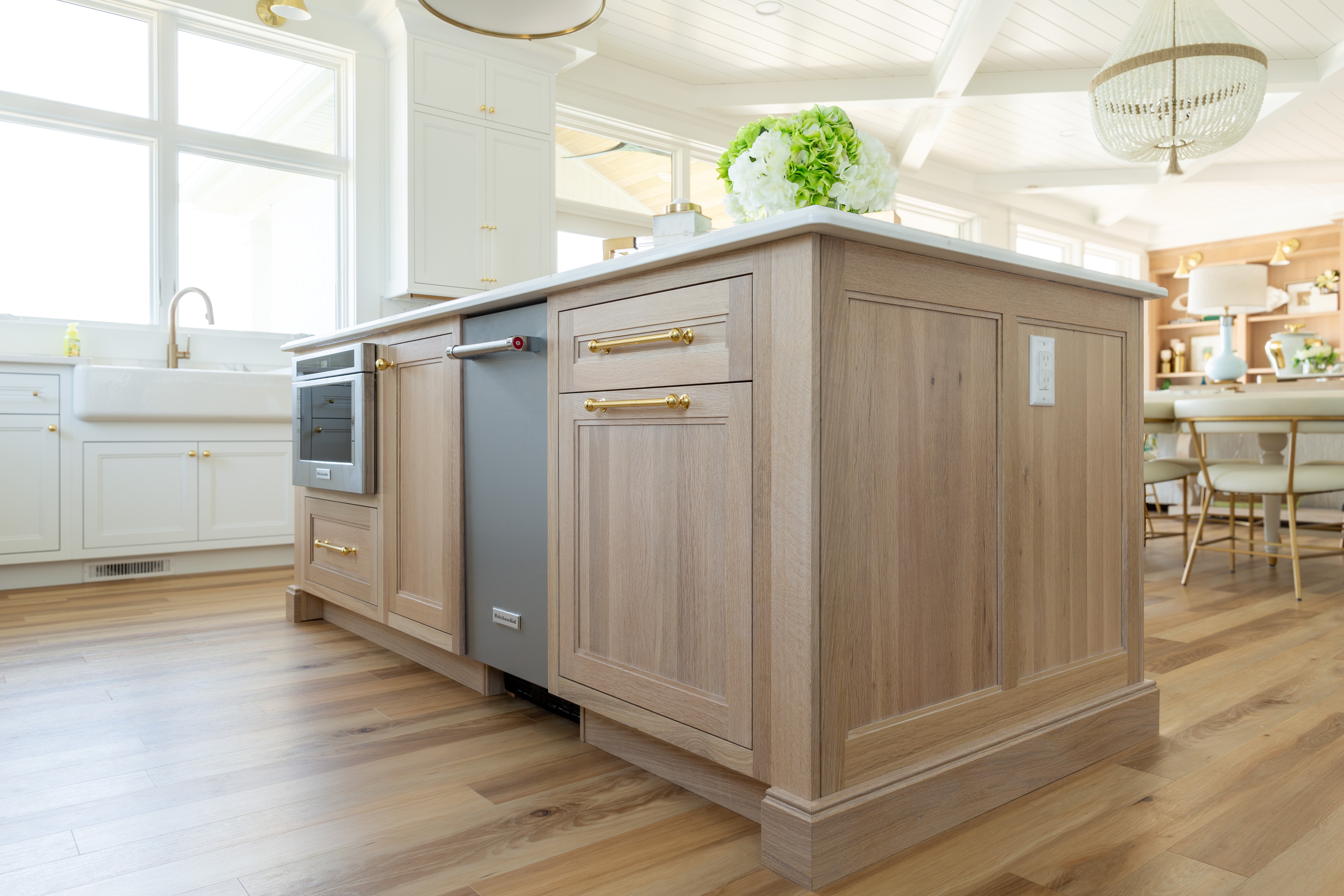 Modern kitchen featuring a customizable Shiloh cabinet with wood finish and stylish hardware.