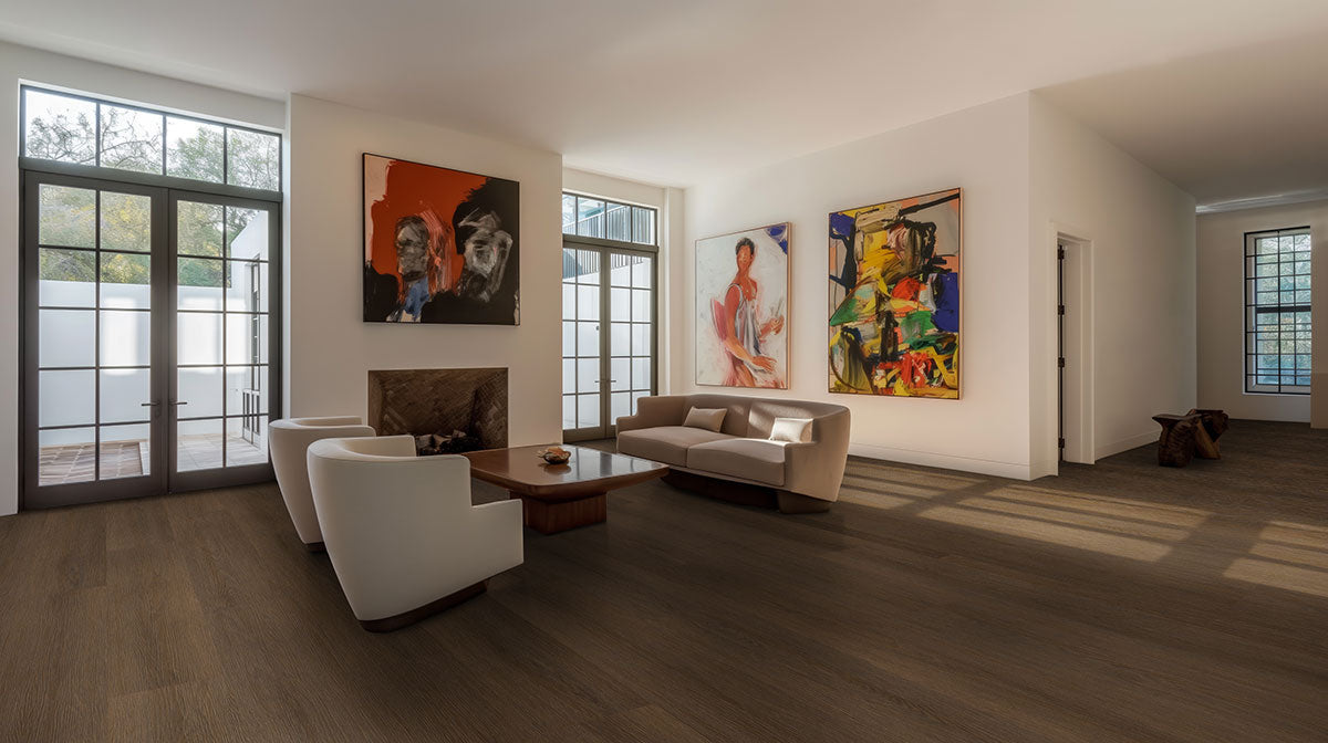 Modern living room featuring Adlar 8.98x48 luxury vinyl tile with low gloss finish and elegant artwork.