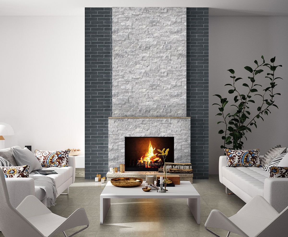 Modern living room featuring a gray stone fireplace, stylish furniture, and a cozy decorative ambiance.