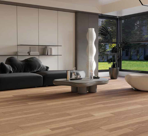 Natura Eleganza Walnut Quercia Porcelain Tile in a modern living room with sleek furniture and natural light.