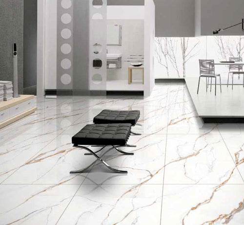 Sleek interior featuring polished white marble tiles with elegant beige veins, complemented by modern black chairs.