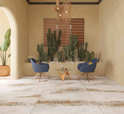 Ruggine Hormigon Molde Tile in a stylish interior with cacti, featuring a modern mat finish and warm decorative elements.
