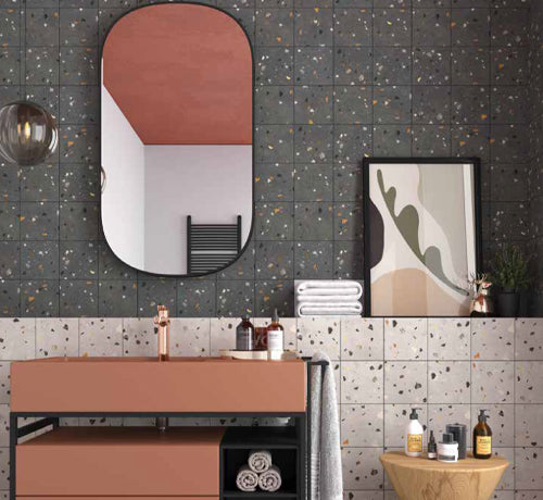 Stylish bathroom featuring Terrazzo Grey Matt Tile on the walls and terracotta vanity, creating a modern aesthetic.