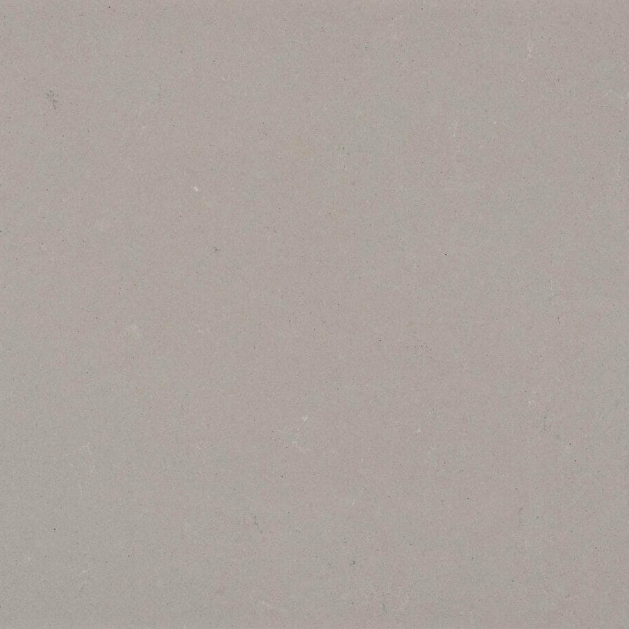 4004 Raw Concrete fabric with soft grey and textured flecks of black and white, perfect for urban aesthetics.