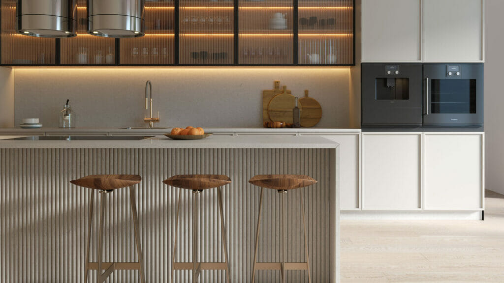 Modern kitchen with an ashen shade island, quartz details, and sleek appliances creating a clean aesthetic.
