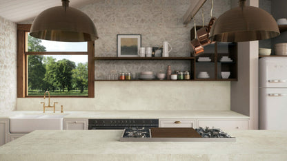 Stylish kitchen featuring whitewashed surfaces, bronze accents, and a warm, tactile Ultra Rough finish with a scenic view.