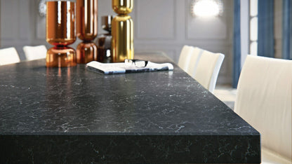 5003 Piatra Grey smooth slate countertop featuring chalky white veins and earthy design elements.