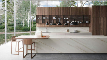 Modern kitchen featuring sleek marble countertop, wooden cabinets, and minimalistic decor with beautiful outdoor views.