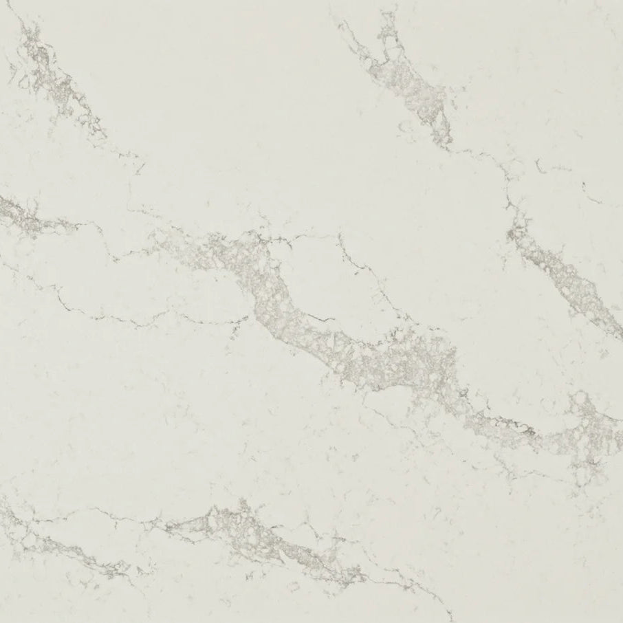 Statuario Maximus surface featuring a dove-white base with light-grey veining for a classic elegant look.