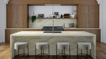 Modern kitchen featuring a 506 Mirabel countertop with ivory tones and charcoal veins, complemented by wood cabinetry.