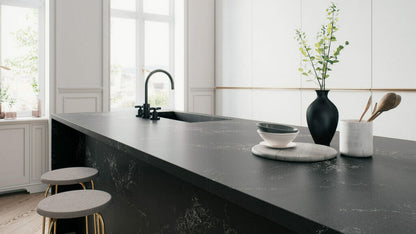 Stylish kitchen with 5101 Empira Black countertop, featuring sleek design, white veining, and elegant decor.