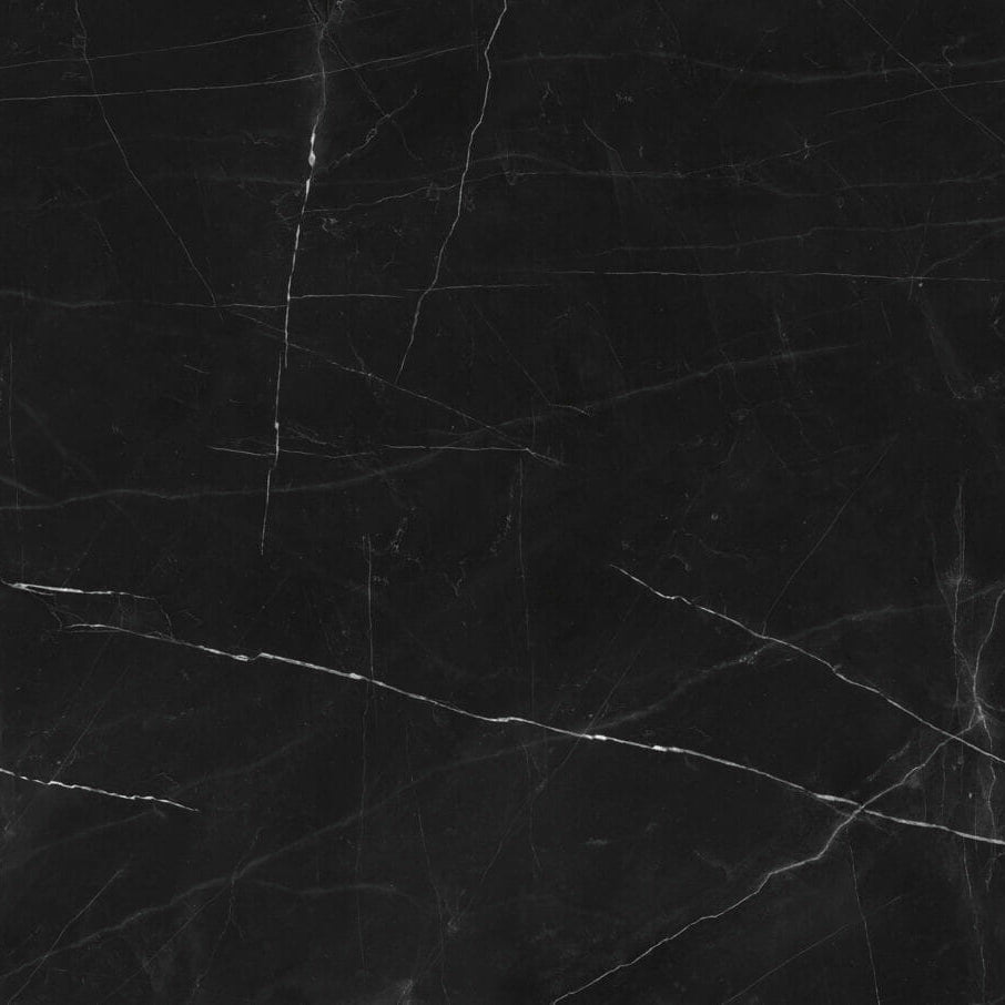 Black marble texture with fine white veins, representing dramatic elegance and luxurious design.