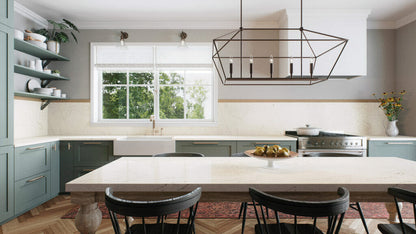 Modern kitchen featuring misty white countertops, earthy veining, and stylish decor, complementing warm natural light.