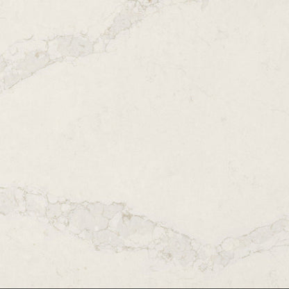 5115 Calacatta Stillstorm surface showing bright white base with subtle grey veins and silvery clouds for elegant designs.