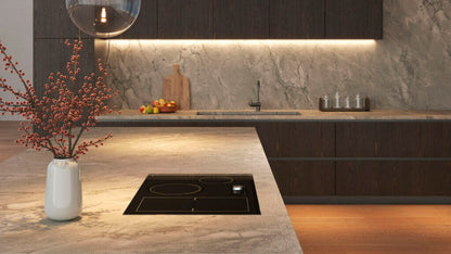 Modern kitchen with 512 Transcenda countertop showcasing oversized marbling and busy veining in a sophisticated design.