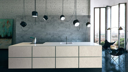 Contemporary kitchen featuring 5130 Cosmopolitan White island, highlighting elegant cream surface with ashen streaks.