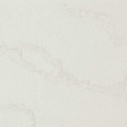 5131 Calacatta Nuvo surface with soft grey streaks on a creamy-white base, ideal for luxury interiors.