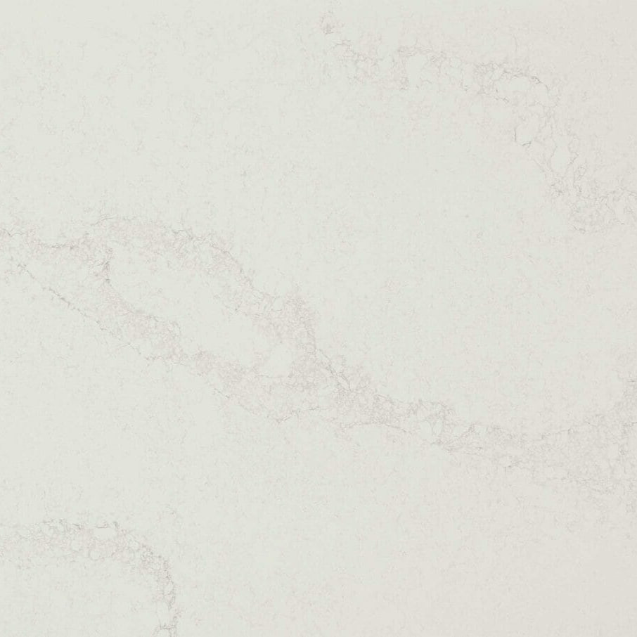 5131 Calacatta Nuvo surface with soft grey streaks on a creamy-white base, ideal for luxury interiors.
