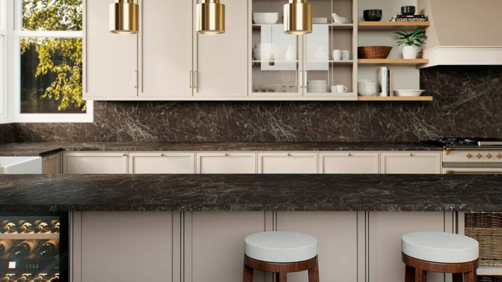 Modern kitchen featuring 514 Emprada countertop with warm earthy tones, crisscrossed chalky lines, and stylish barstools.