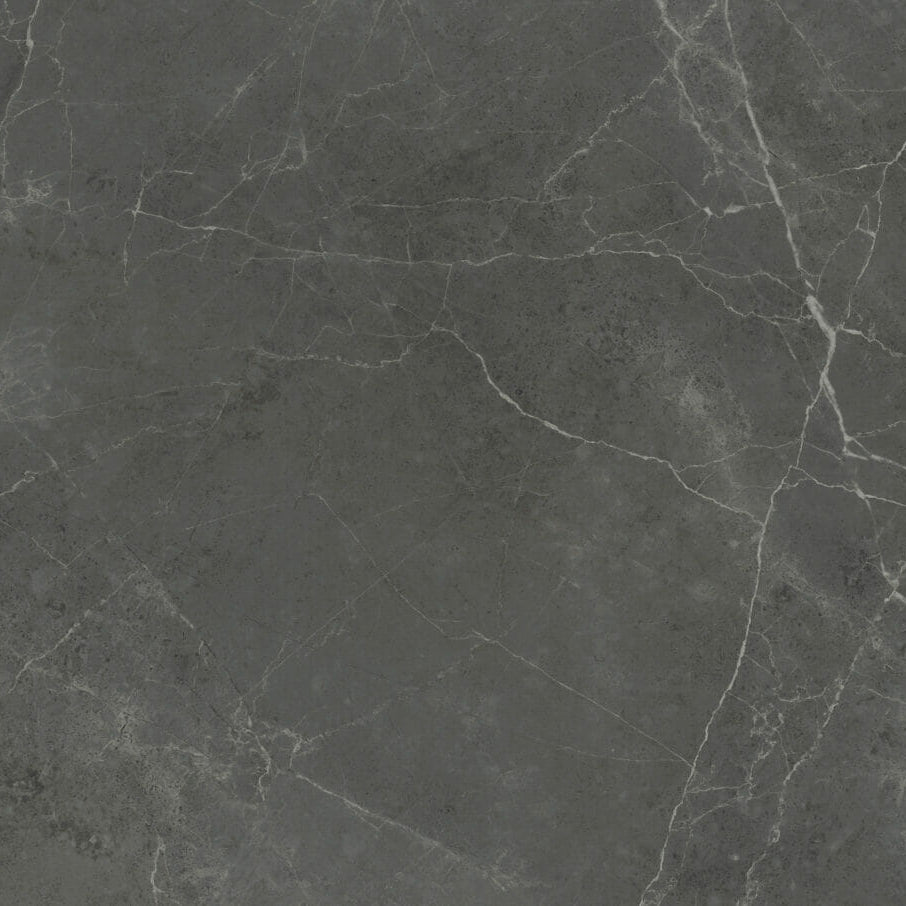 Dark grey stone surface with warm brown accents and white organic veins, featuring dramatic oxidisation effects.