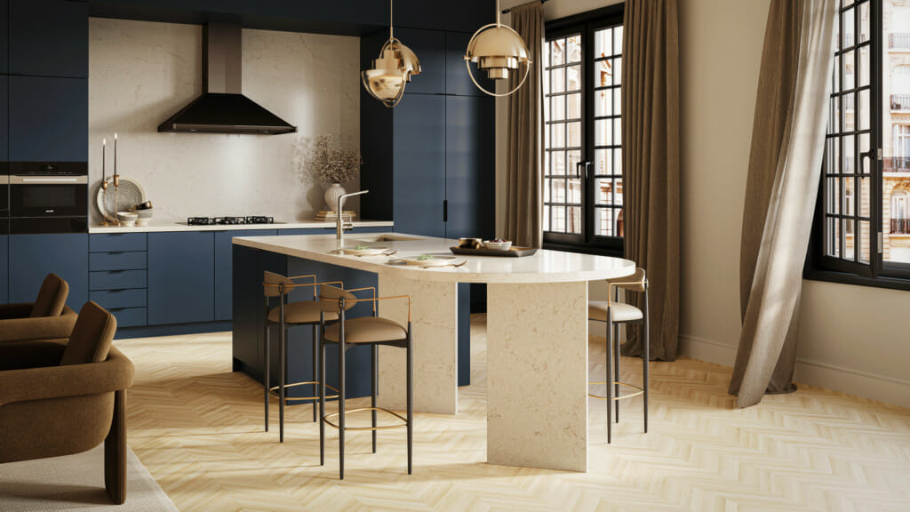 Modern kitchen design featuring a marble island, dark cabinetry, and stylish bar stools, illuminated by elegant pendant lights.