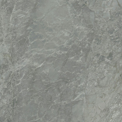 Honed finish 533 Silverdrop stone with pearl grey base and feathery seafoam veining, showcasing bluish undertones.