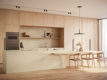 Modern kitchen featuring 543 Marenstone countertop with wooden cabinetry and warm lighting, showcasing stone finish and minimalist design.