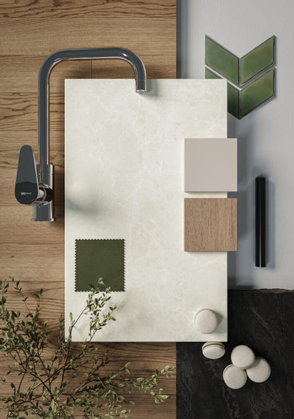 Sample of 581 Lucillia surface with faucet, showcasing warm white finish, accents, and complementary tiles and textures.