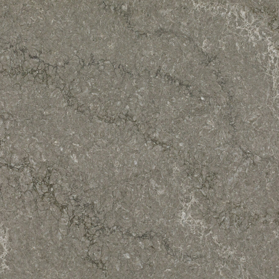 6313 Turbine Grey granite with swirls of dark and light veins showcasing a textured stone surface.