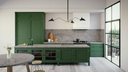 Modern kitchen featuring green cabinetry and 6313 Turbine Grey granite countertops with textured grey swirls and veins.