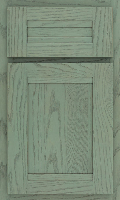 Shiloh Somerset cabinet door featuring a unique green finish with customizable wood and design options.