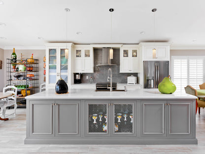 Modern kitchen featuring Shiloh cabinets in gray, with a central island, stylish fixtures, and bright decor.
