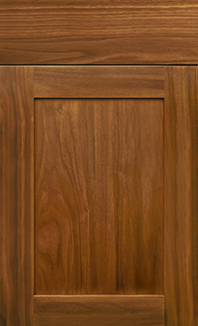 Designer Collection Lakeland cabinet door with various finishes, showcasing rich wood texture and elegant design.