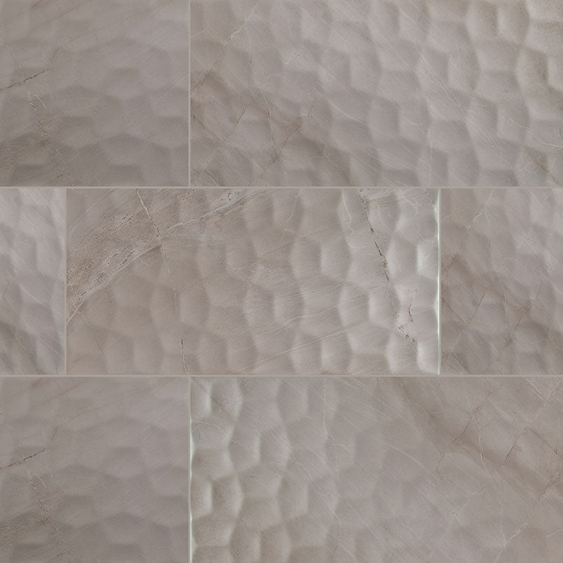 Adella Viso Gris large-format ceramic tile with distinctive relief pattern in satin finish.