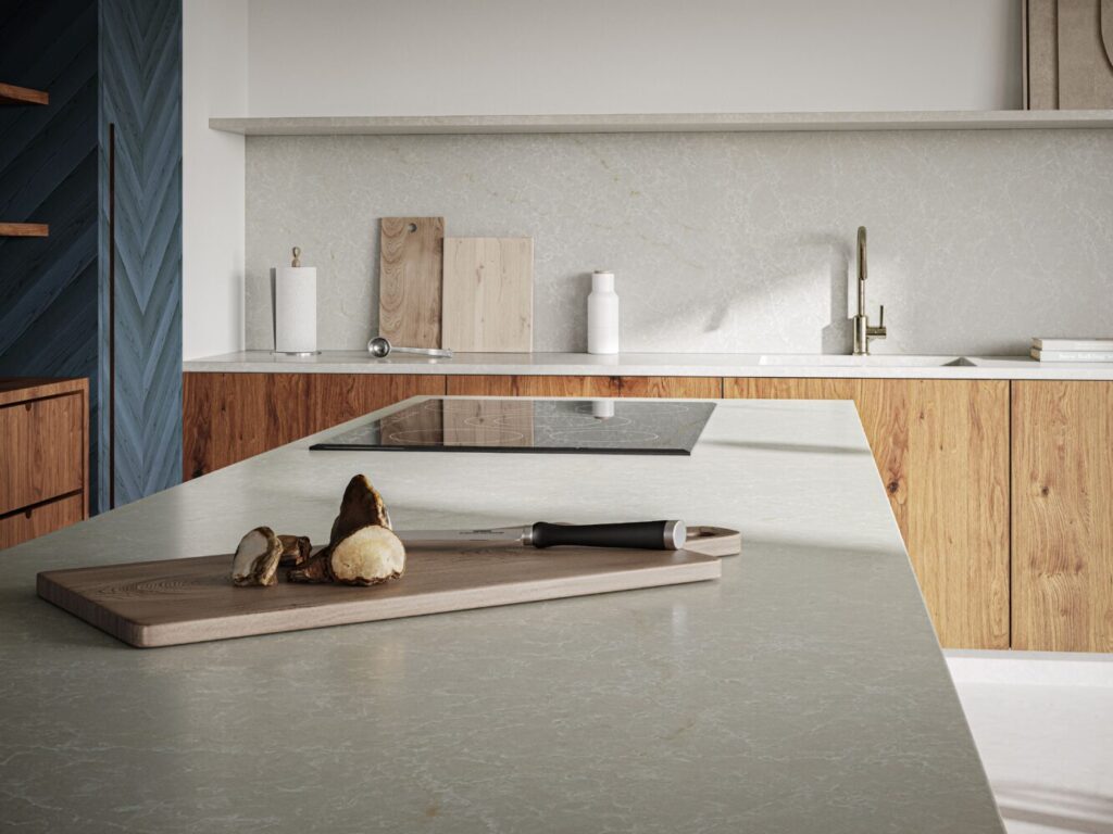 A modern kitchen featuring Brillianza countertop with frosty white veins, highlighting its elegant design.