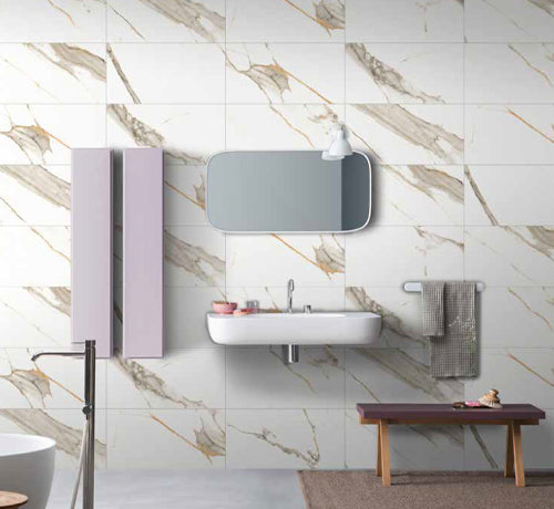 Carrara White polished tiles featured in a modern bathroom, showcasing elegant marble veining design.