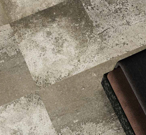 Greggio Beton Bianco Grey Tile - Lapata, featuring a textured surface in neutral grey tones, ideal for modern interiors.