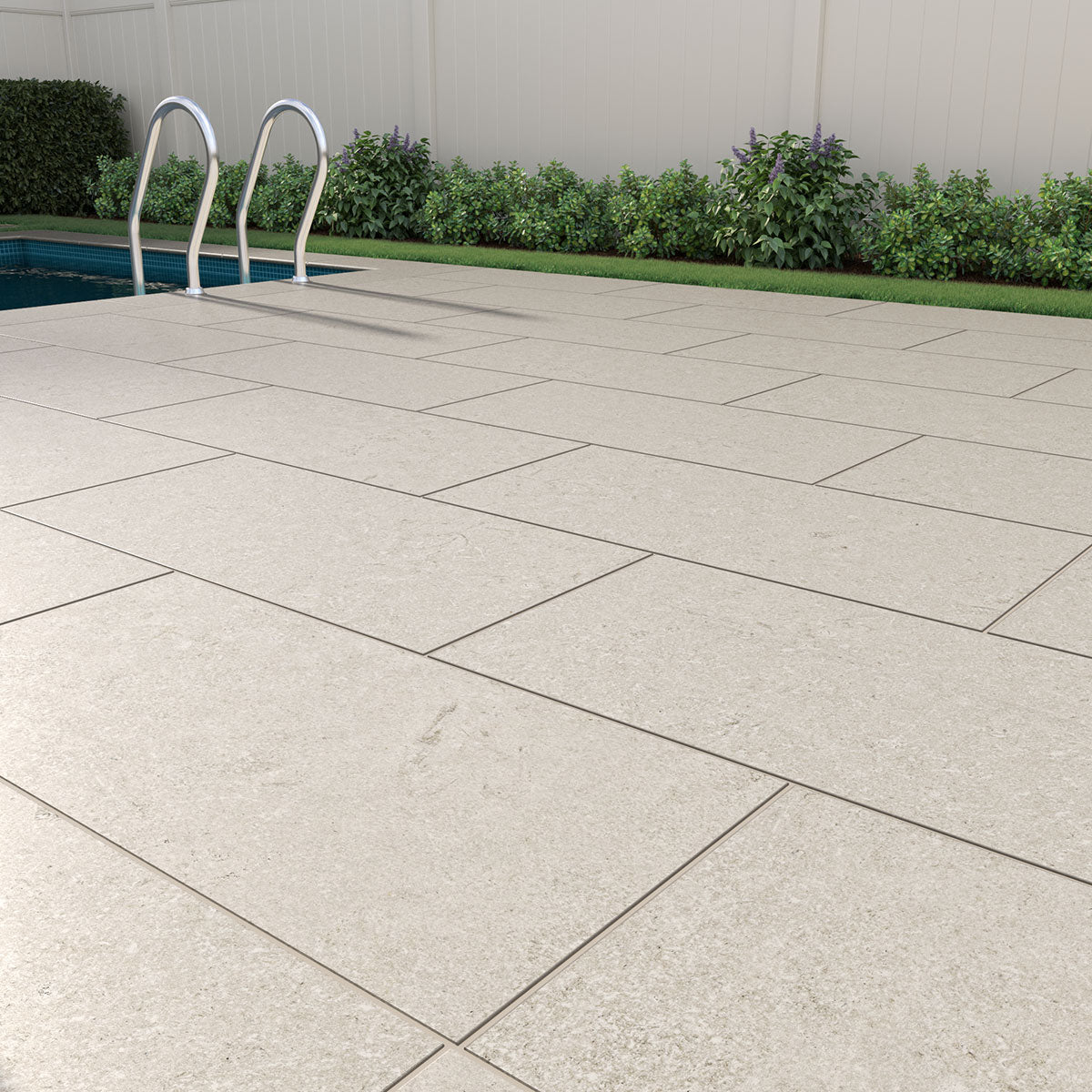 Livingstyle Pearl 18x36 Matte porcelain pavers showcasing a soft gray tone, ideal for patios and pool surrounds.