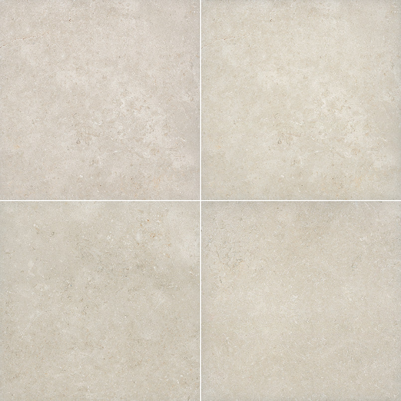 Livingstyle Pearl 18x36 Matte porcelain pavers in soft gray, resembling natural limestone, ideal for outdoor spaces.
